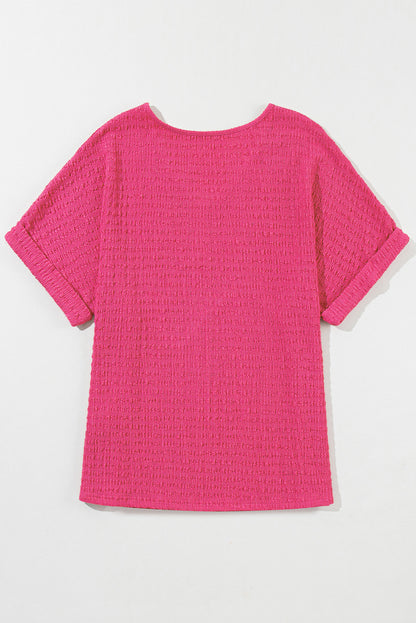 Blusa con cuello en V y manga corta enrollada con textura rosa brillante