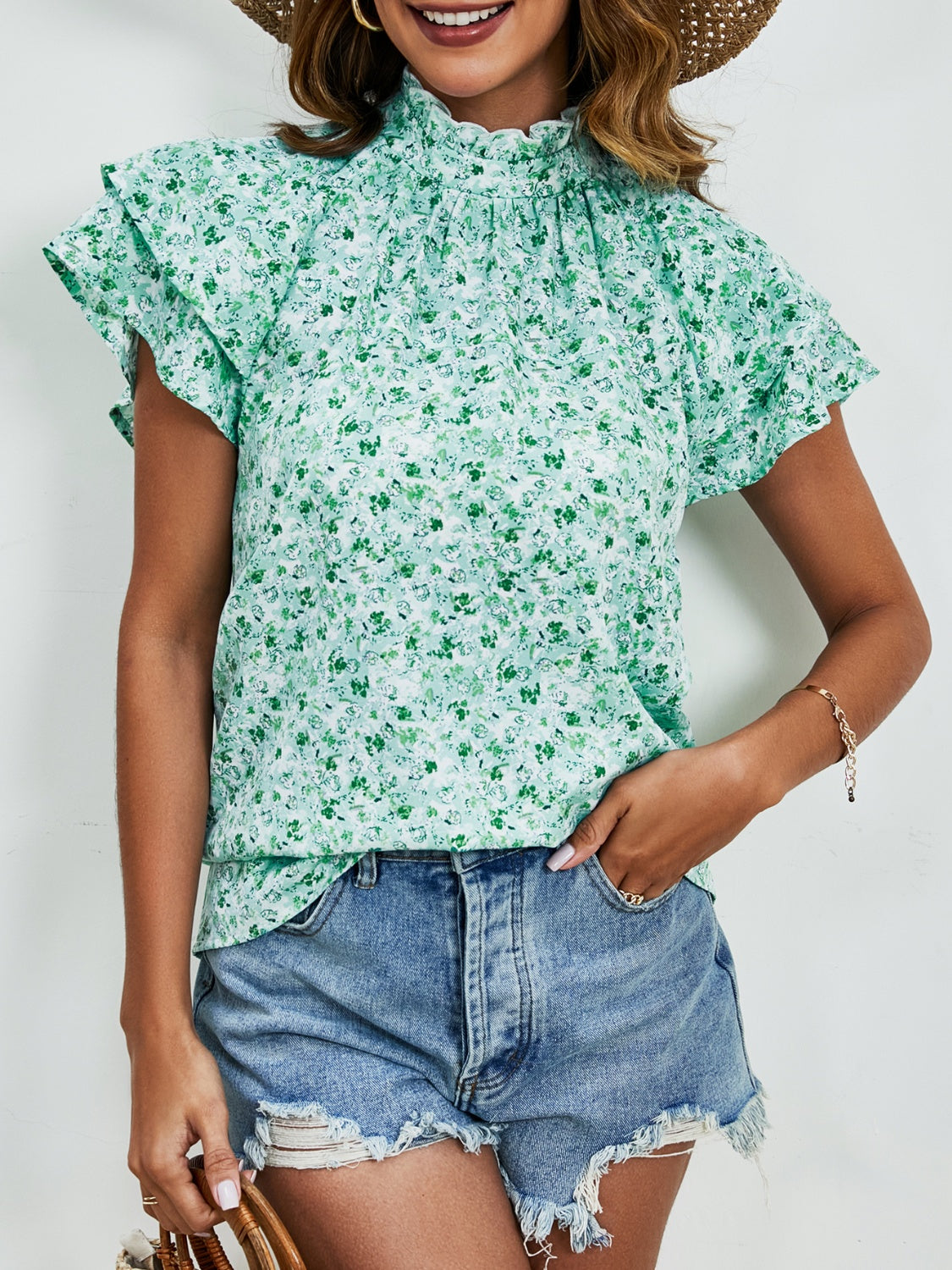 Blusa con mangas con volante y cuello simulado con estampado floral de florecitas