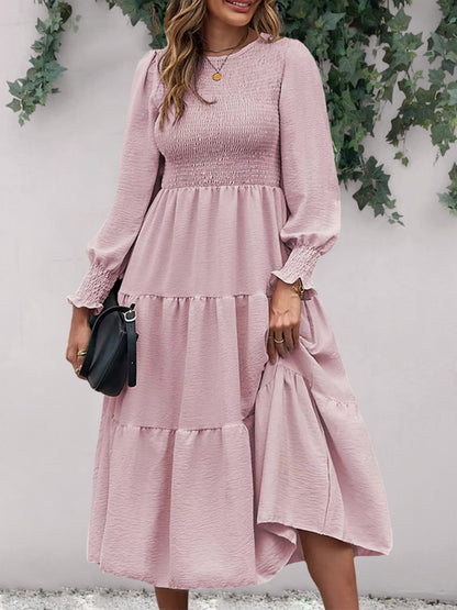 Robe midi smockée à col rond et manches longues