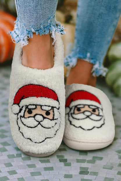 Chaussons de Noël blancs en peluche avec motif père Noël