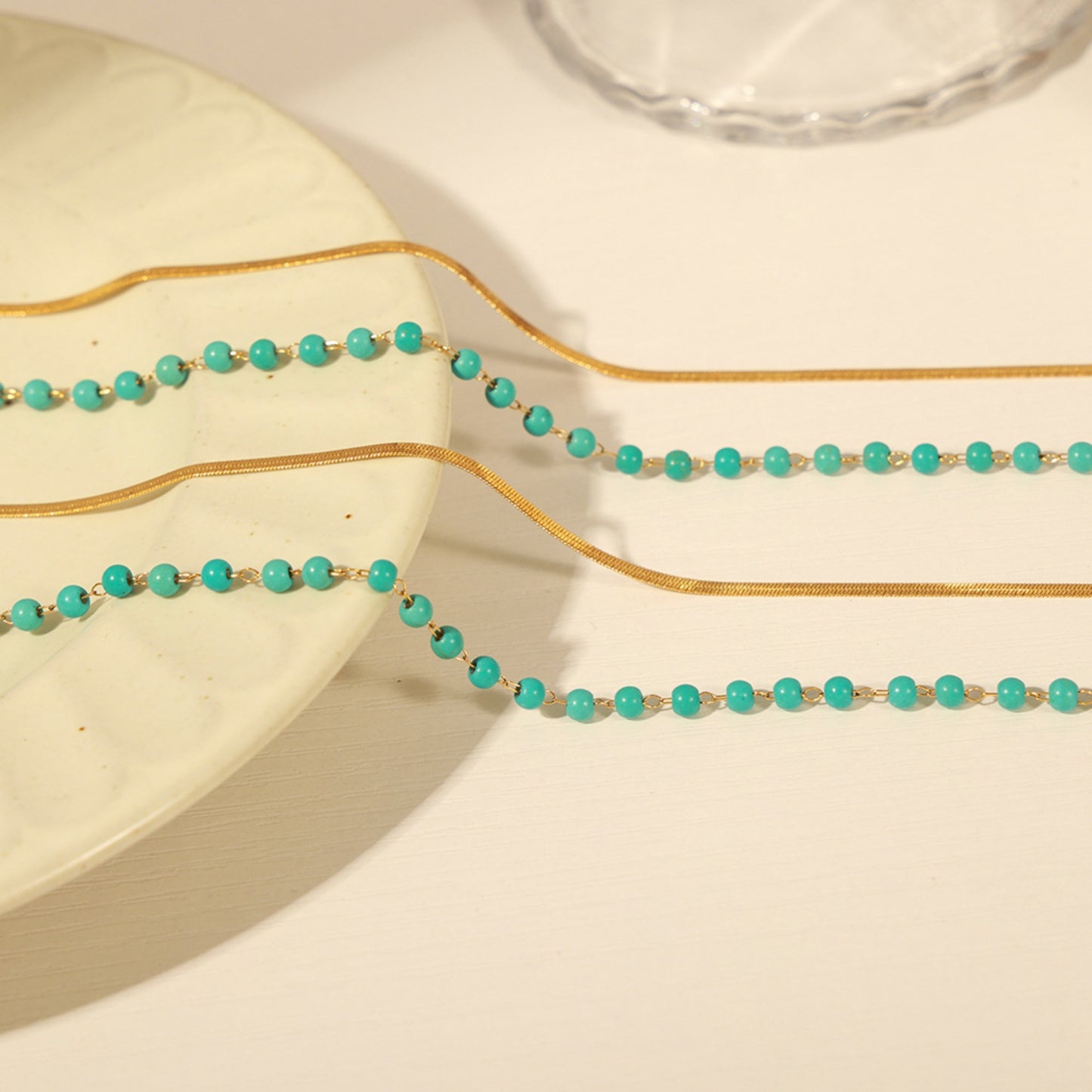 Collier double couche en acier titane turquoise