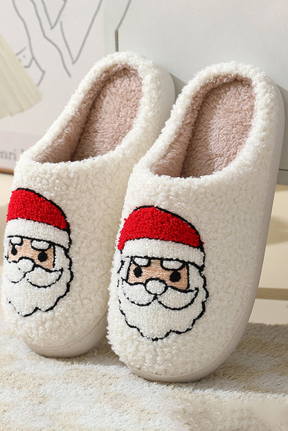 Chaussons de Noël blancs en peluche avec motif père Noël