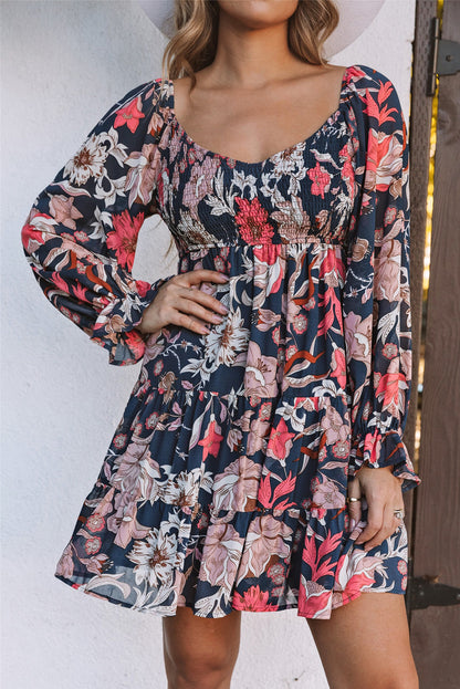 Minivestido floral de manga larga abullonada con gradas azul