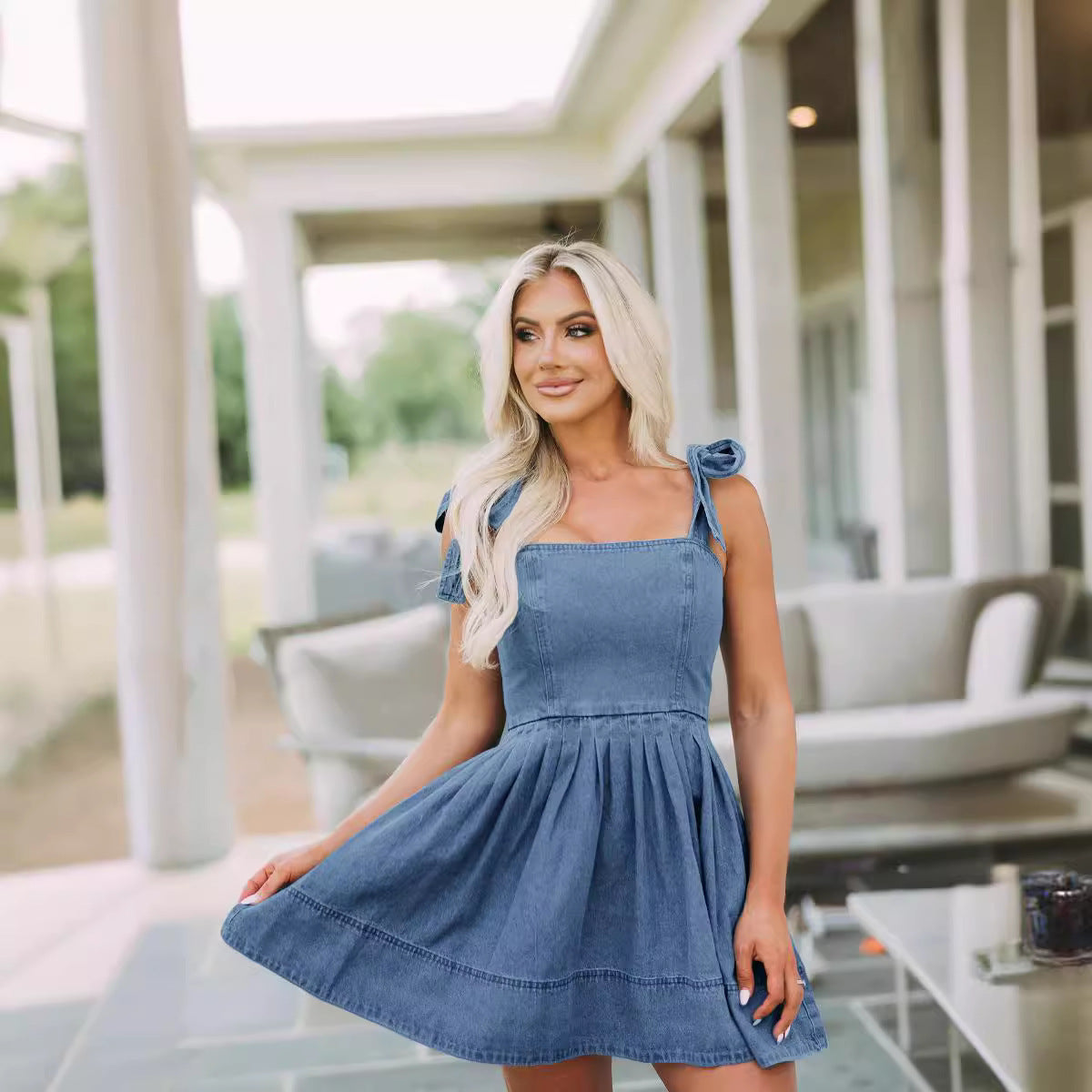 Vestido de mujer de mezclilla con tirantes de moda de viaje con temperamento de primavera y verano europeo y americano