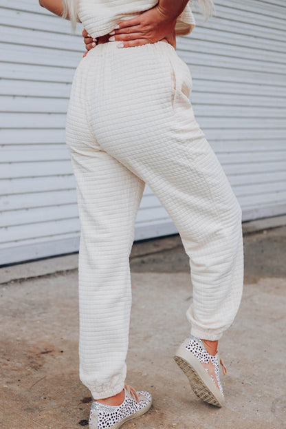 Conjunto de pantalones jogger y camiseta corta con textura de celosía roja rosa