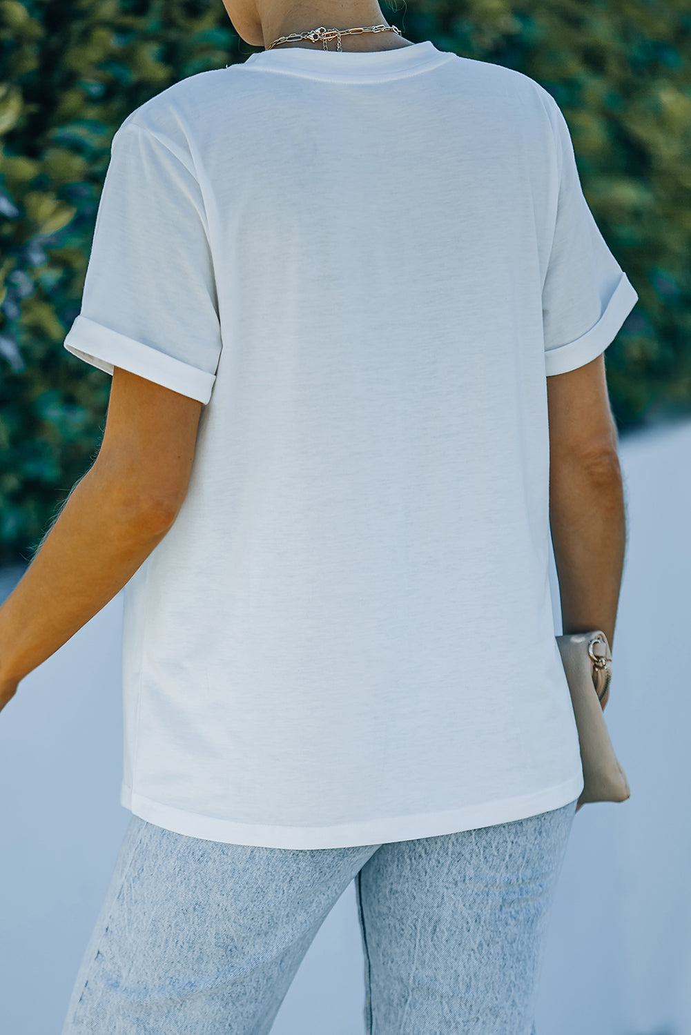 T-shirt graphique blanc avec slogan du jour de Pâques et œufs