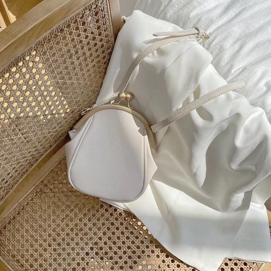 Petit sac messager rond simple et polyvalent à une épaule pour femme