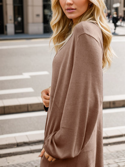 Vestido de manga larga con cuello en V y medio botón con bolsillos