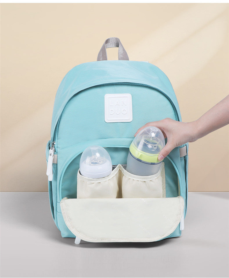 Sac à double épaule multifonctionnel imperméable pour mère et bébé, couleur vive