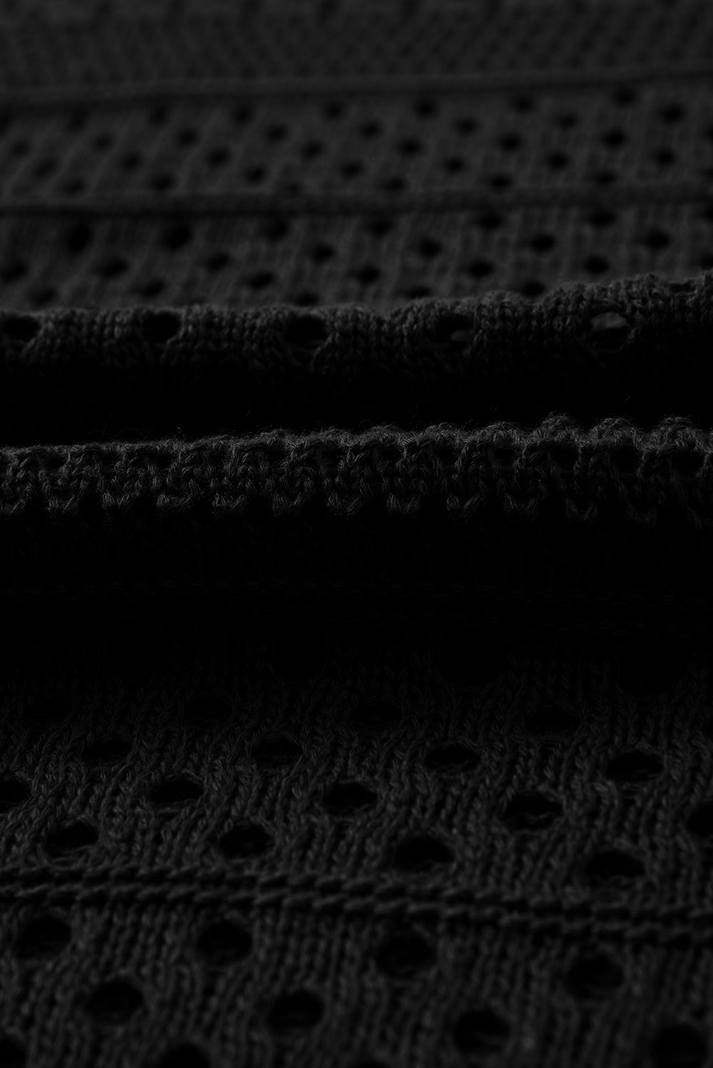 Vestido tipo pareo con aberturas de crochet ahuecadas en negro