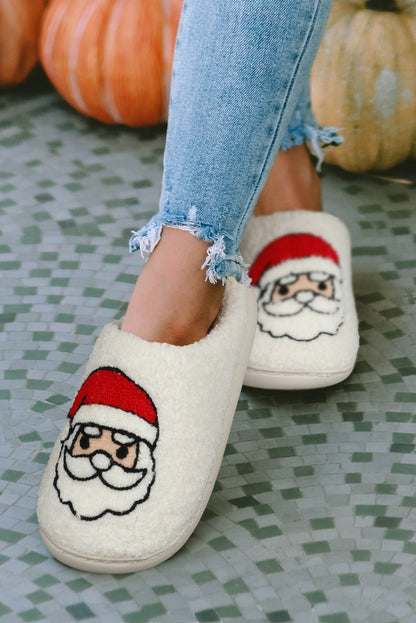 Chaussons de Noël blancs en peluche avec motif père Noël