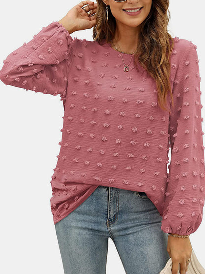 Blusa de manga larga con cuello redondo y lunares suizos