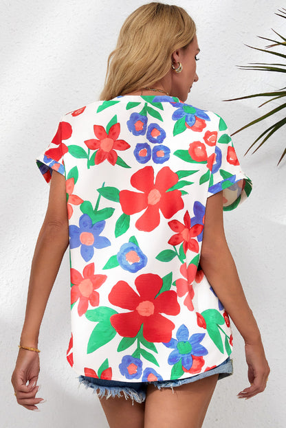 Blusa con cuello en V y bolsillo en el pecho con estampado de flores