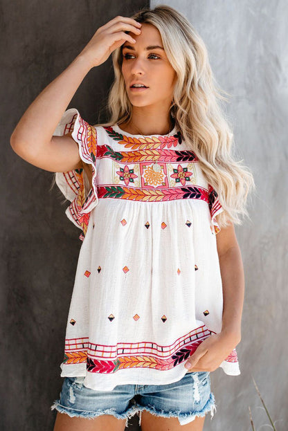 Top babydoll bohemio con volantes y estampado abstracto blanco