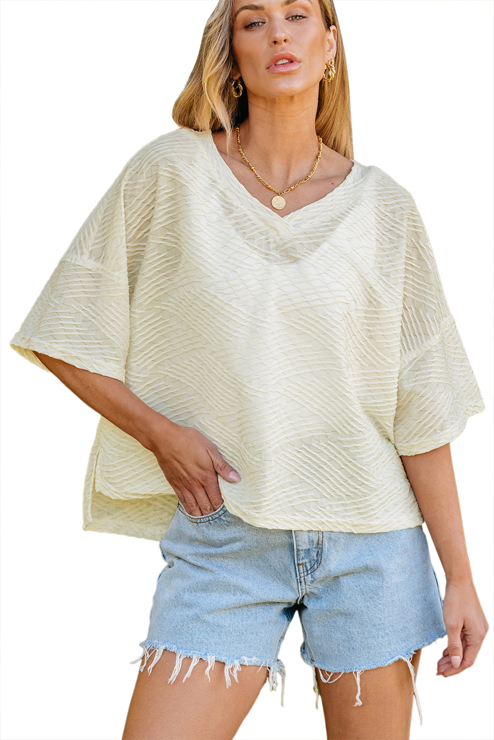 Haut oversize beige texturé à col en V et ourlet fendu