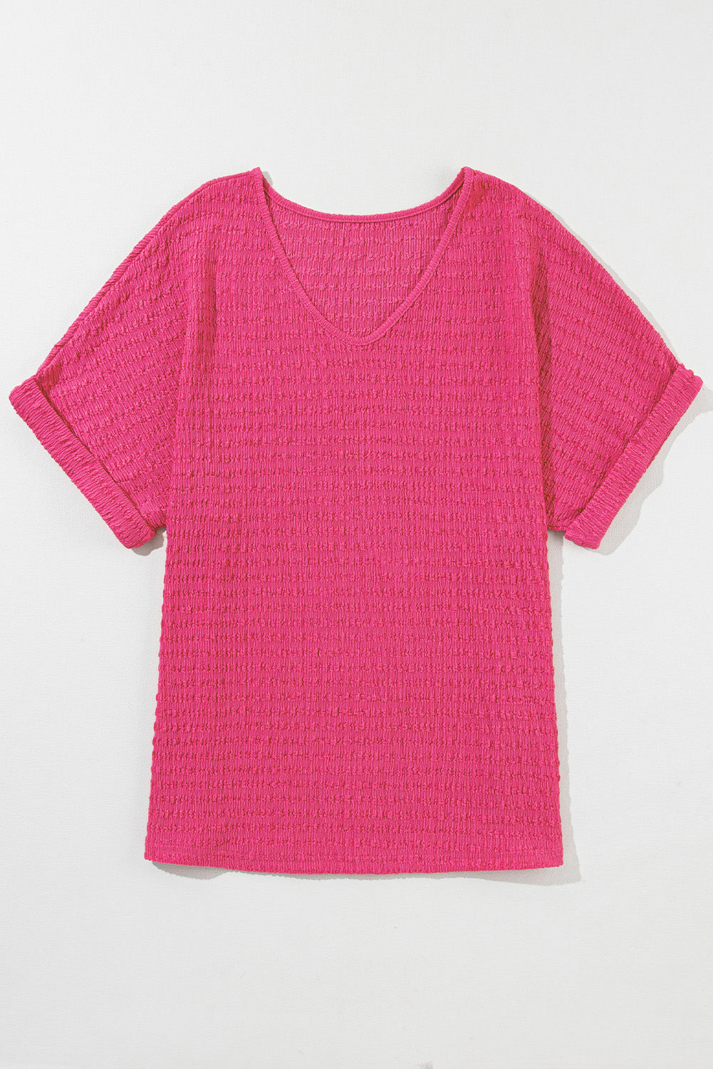 Blusa con cuello en V y manga corta enrollada con textura rosa brillante