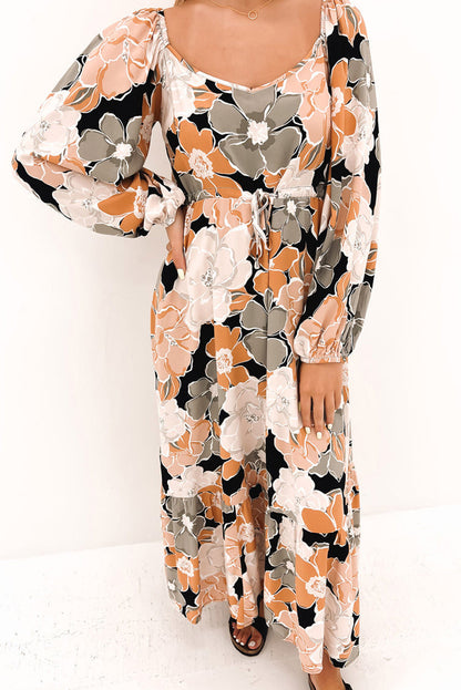 Robe longue florale audacieuse à manches bouffantes et à nouer à la taille