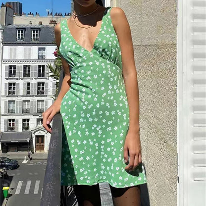 Robe taille haute à nouer à pois et col en V