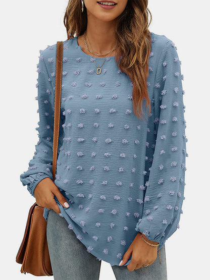 Blusa de manga larga con cuello redondo y lunares suizos