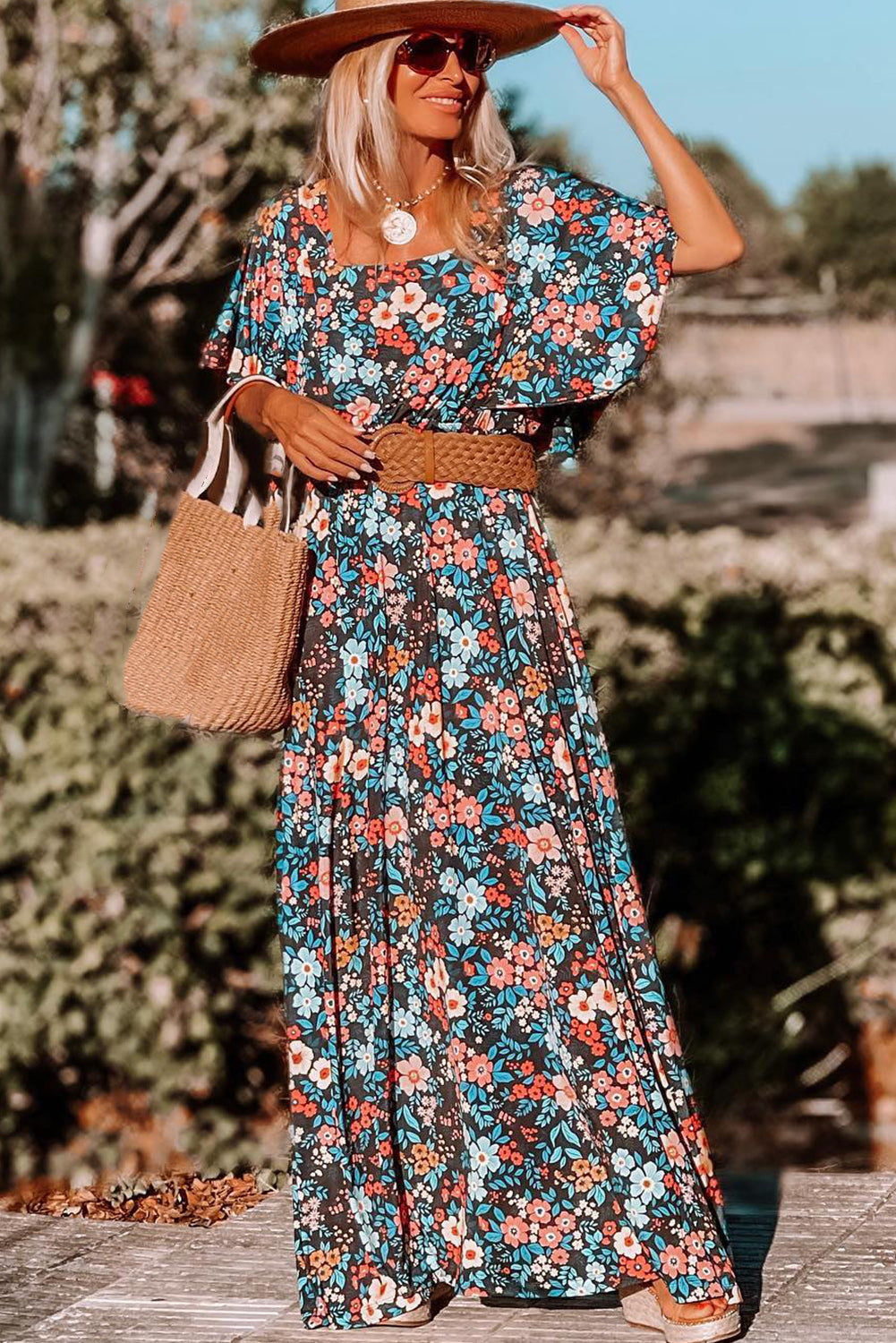 Robe longue dos nu nouée à imprimé floral bohème bleu ciel