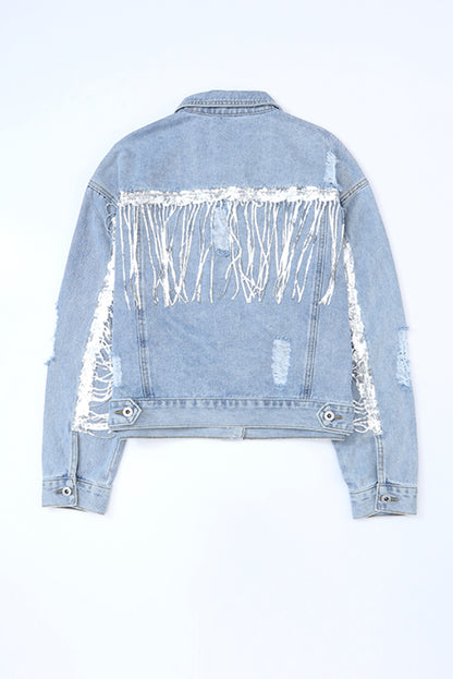 Veste en jean effet vieilli à franges ornées de sequins bleu ciel