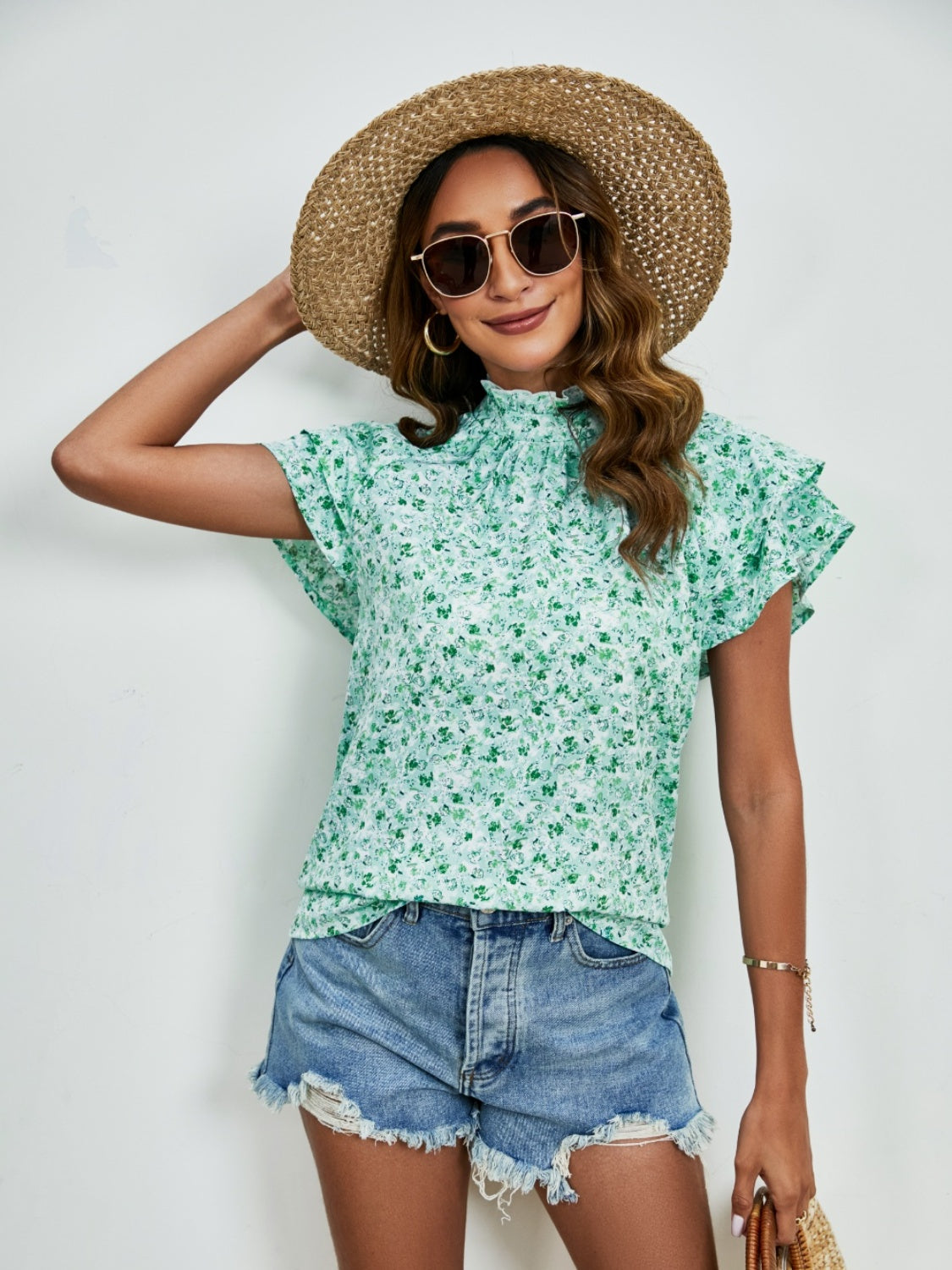 Blusa con mangas con volante y cuello simulado con estampado floral de florecitas