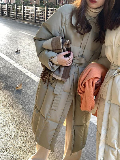 Chaqueta pequeña de longitud media con plumón de pato blanco