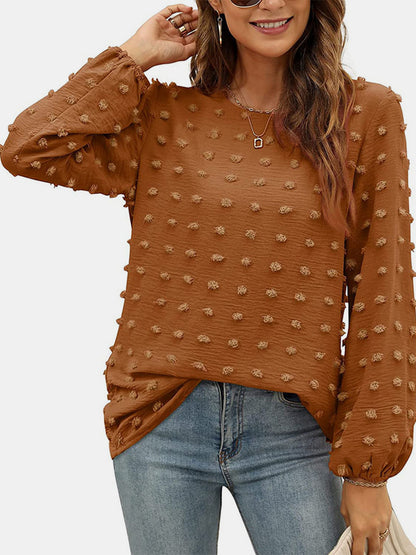 Blusa de manga larga con cuello redondo y lunares suizos