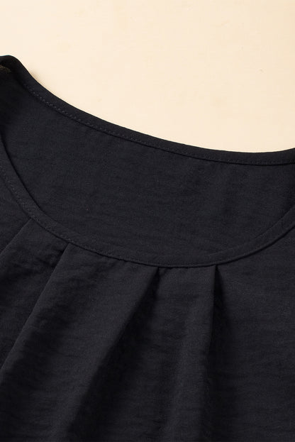 Blusa de manga acampanada plisada texturizada de color sólido negro