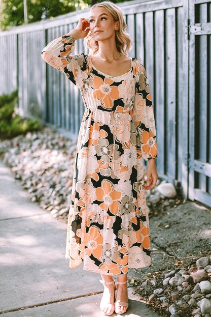 Robe longue florale audacieuse à manches bouffantes et à nouer à la taille