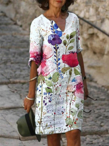 Vestido con cuello en V y estampado de hojas de flores