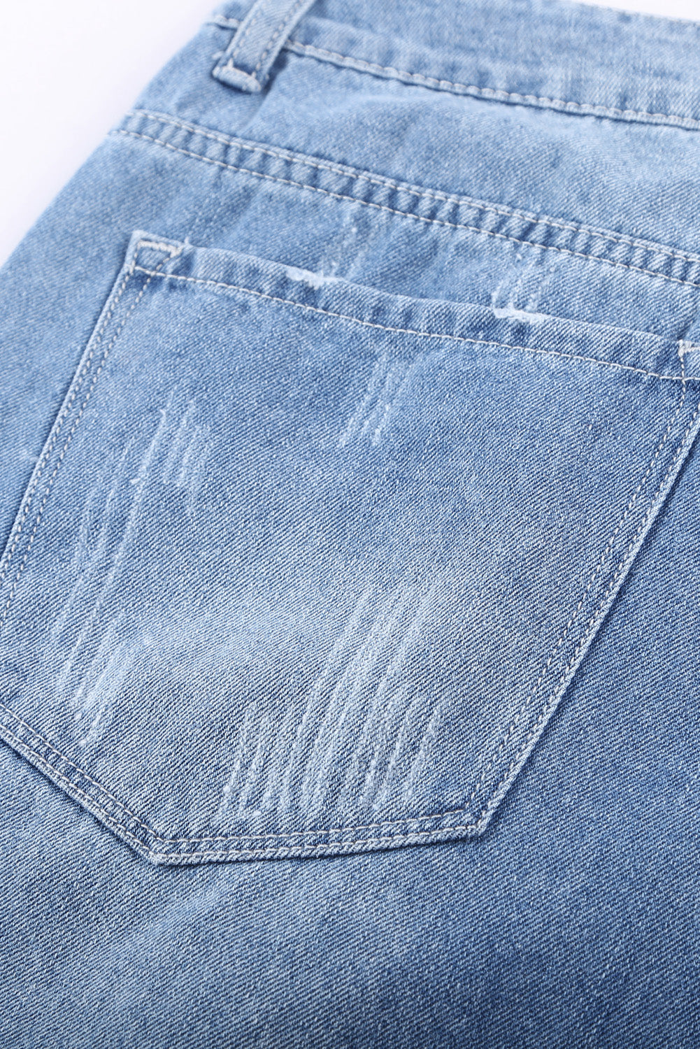 Short en jean bleu ciel déchiré et déchiré à ourlet roulé