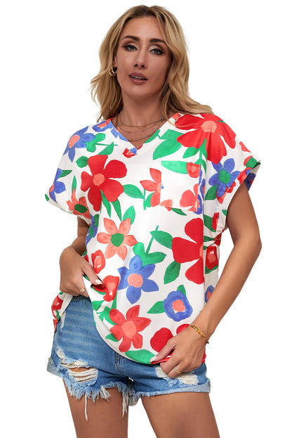 Blusa con cuello en V y bolsillo en el pecho con estampado de flores