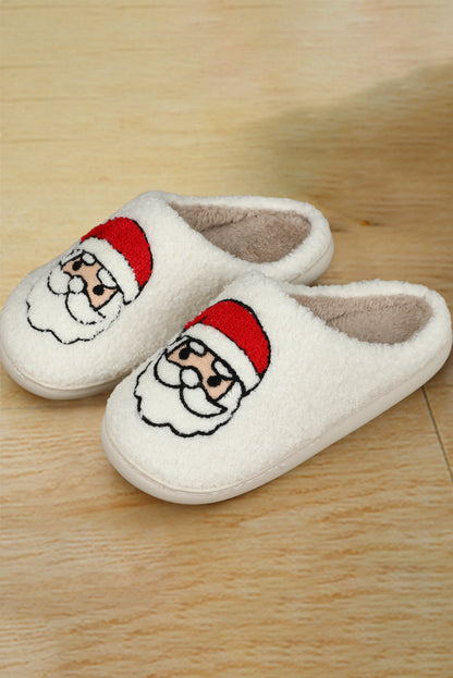 Chaussons de Noël blancs en peluche avec motif père Noël