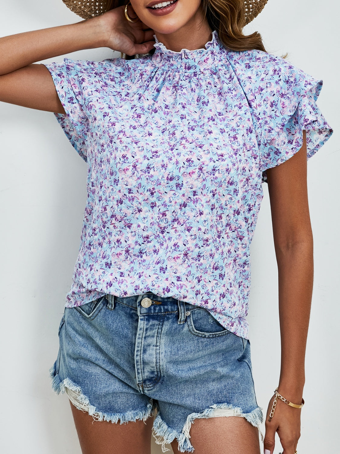 Blusa con mangas con volante y cuello simulado con estampado floral de florecitas