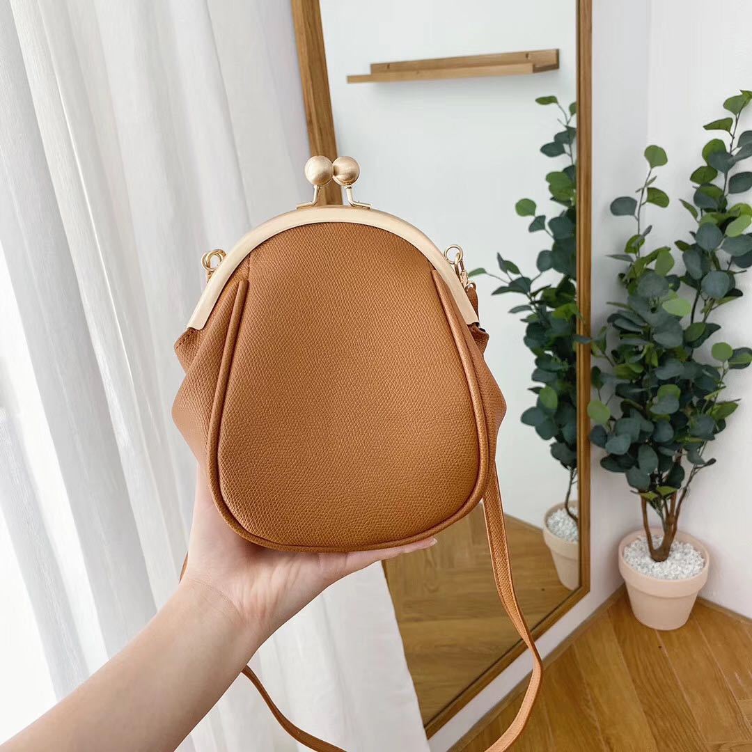 Petit sac messager rond simple et polyvalent à une épaule pour femme