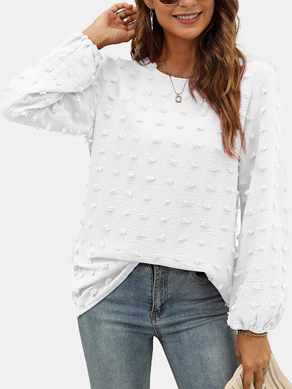 Blusa de manga larga con cuello redondo y lunares suizos