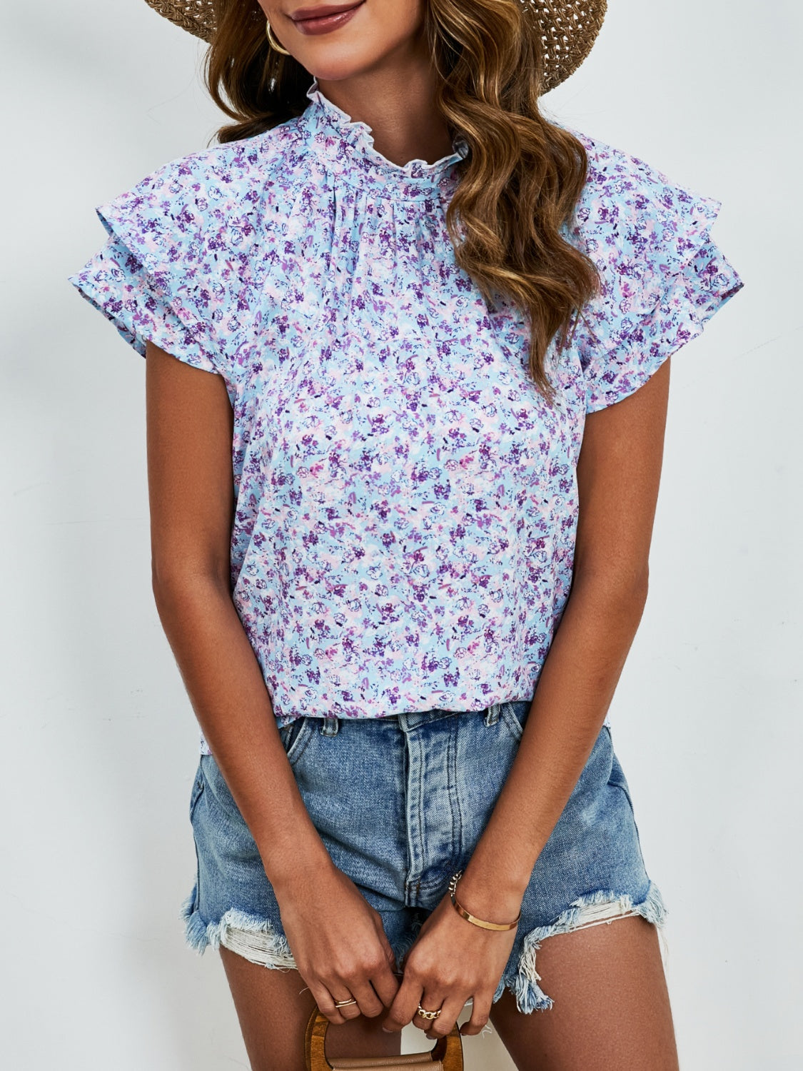 Blusa con mangas con volante y cuello simulado con estampado floral de florecitas