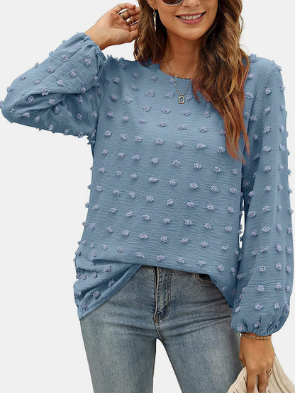 Blusa de manga larga con cuello redondo y lunares suizos