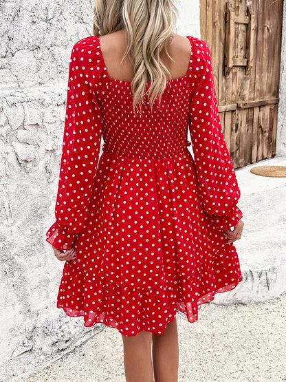 Robe smockée à pois et manches longues