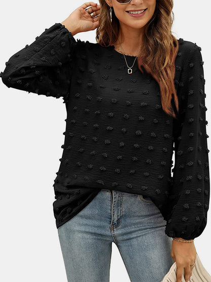 Blusa de manga larga con cuello redondo y lunares suizos